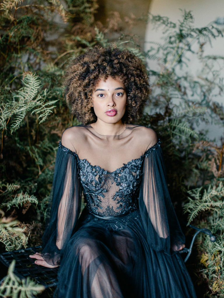 An ethereal french bridal boudoir with a gauzy black Daalarna dress