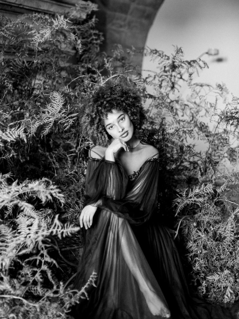 An ethereal french bridal boudoir with a gauzy black Daalarna dress