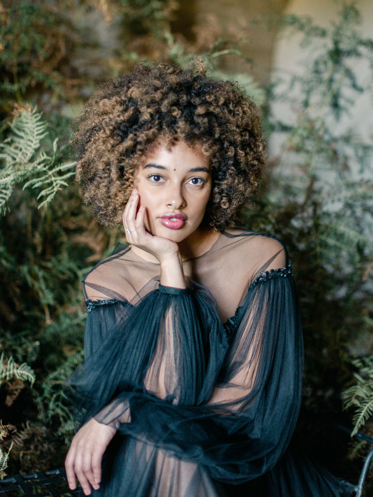 An ethereal french bridal boudoir with a gauzy black Daalarna dress