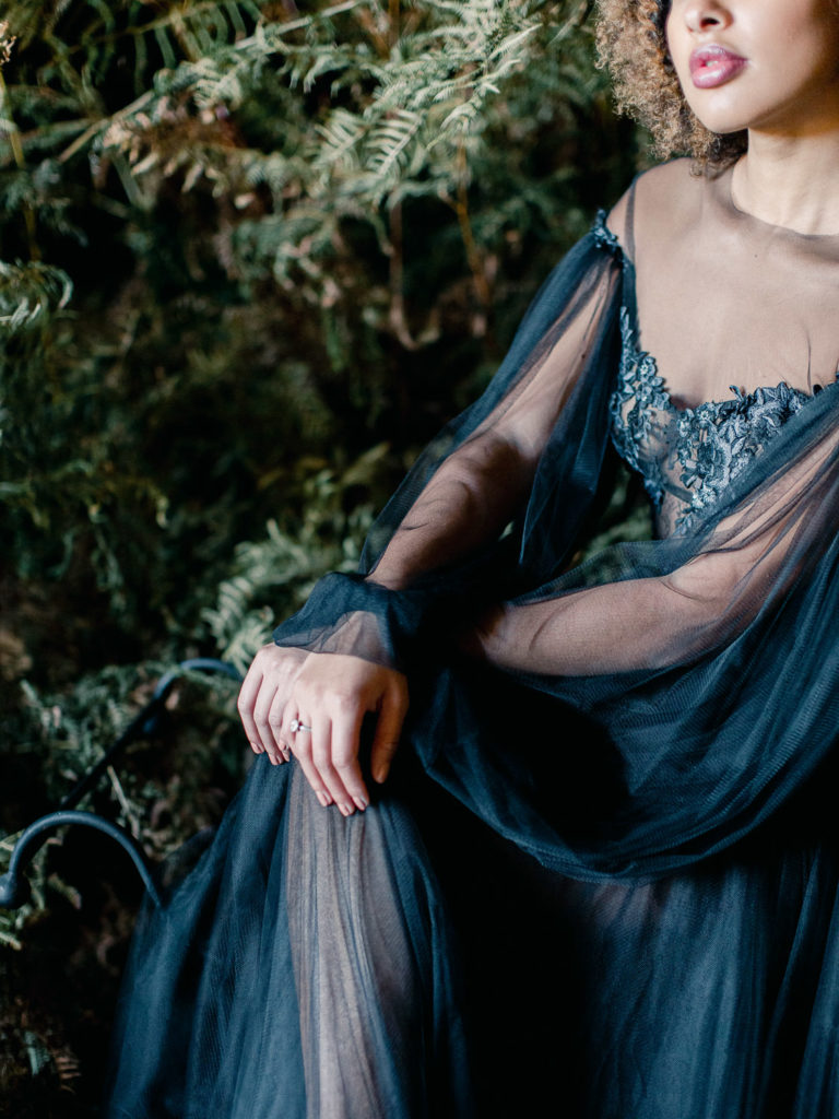 An ethereal french bridal boudoir with a gauzy black Daalarna dress