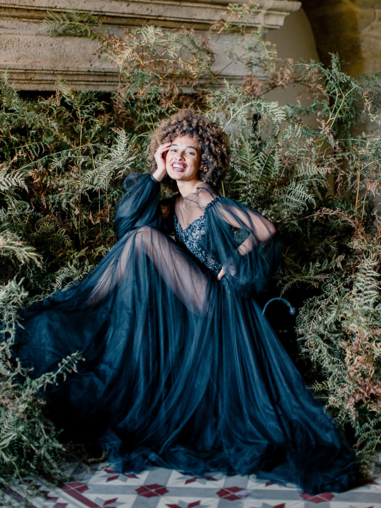 An ethereal french bridal boudoir with a gauzy black Daalarna dress