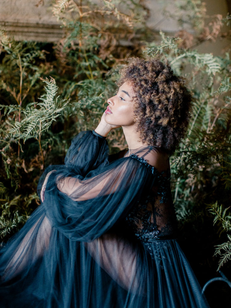 An ethereal french bridal boudoir with a gauzy black Daalarna dress