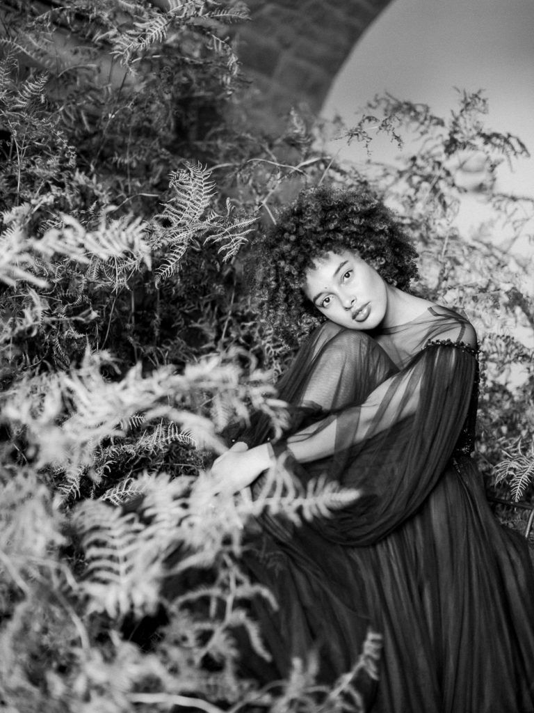 An ethereal french bridal boudoir with a gauzy black Daalarna dress