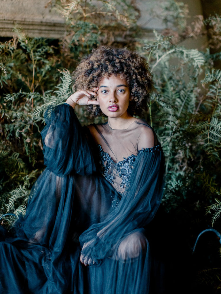 An ethereal french bridal boudoir with a gauzy black Daalarna dress