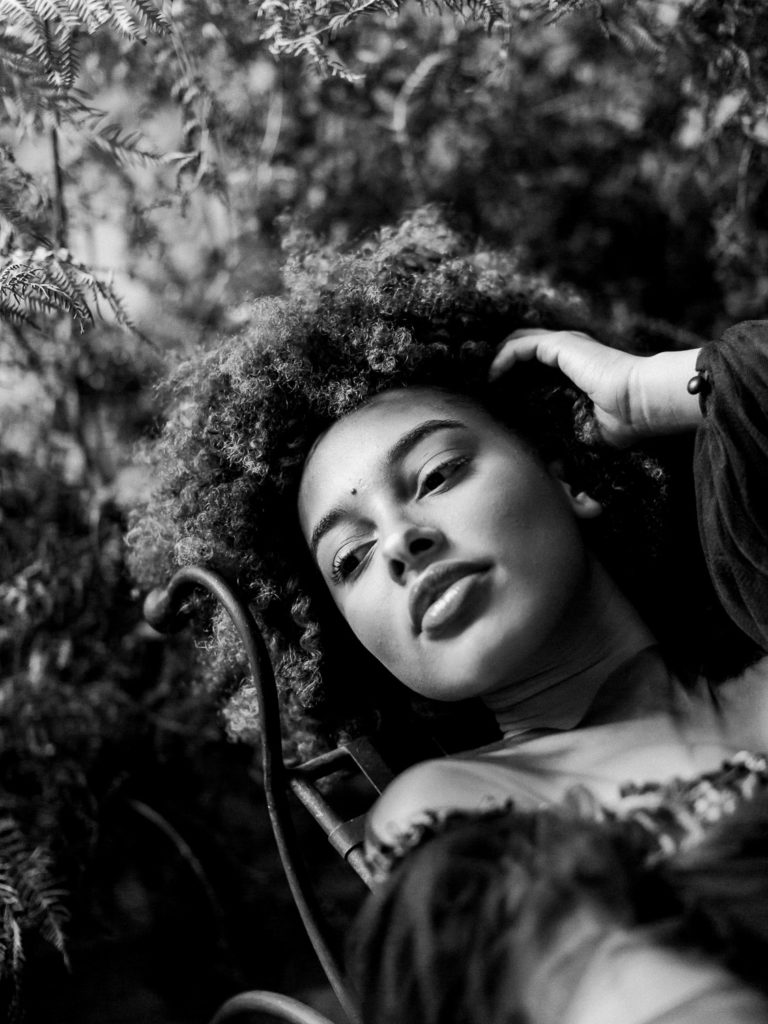 An ethereal french bridal boudoir with a gauzy black Daalarna dress