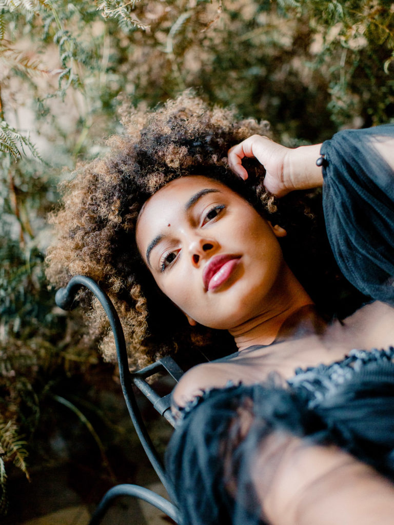 An ethereal french bridal boudoir with a gauzy black Daalarna dress