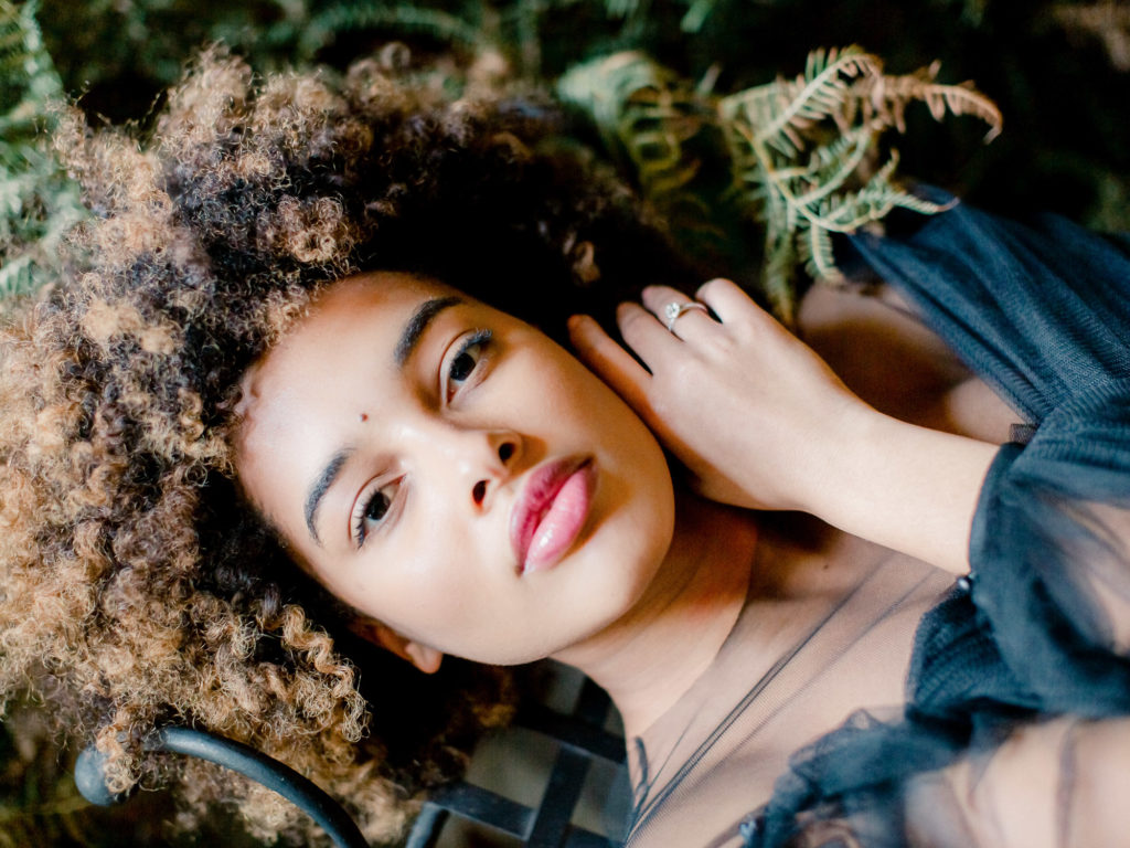 An ethereal french bridal boudoir with a gauzy black Daalarna dress