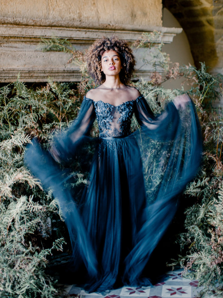 An ethereal french bridal boudoir with a gauzy black Daalarna dress