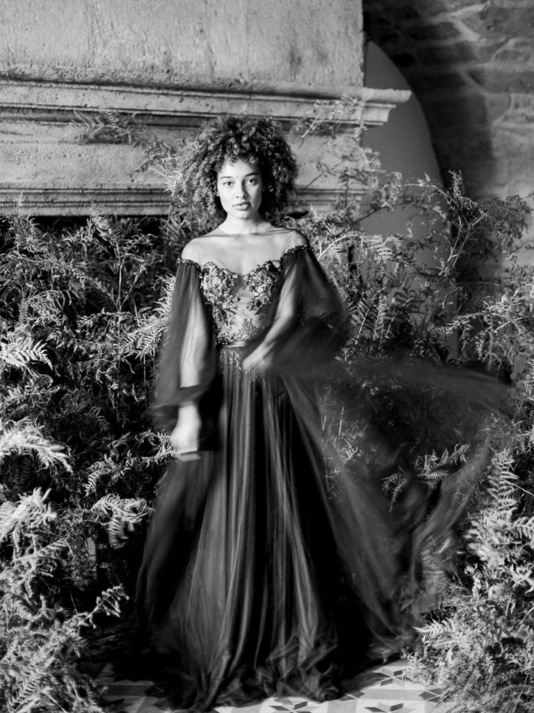 An ethereal french bridal boudoir with a gauzy black Daalarna dress